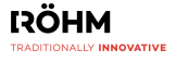 Das Logo von RÖHM verbindet eine klare Typografie mit dem Claim „Traditionally Innovative“ und steht für Präzision, Fortschritt und industrielle Spitzenleistungen. Als Kunde der ISO-Gruppe setzt RÖHM auf moderne Daten- und IT-Lösungen, um Innovation mit bewährter Qualität in der Fertigung zu vereinen.