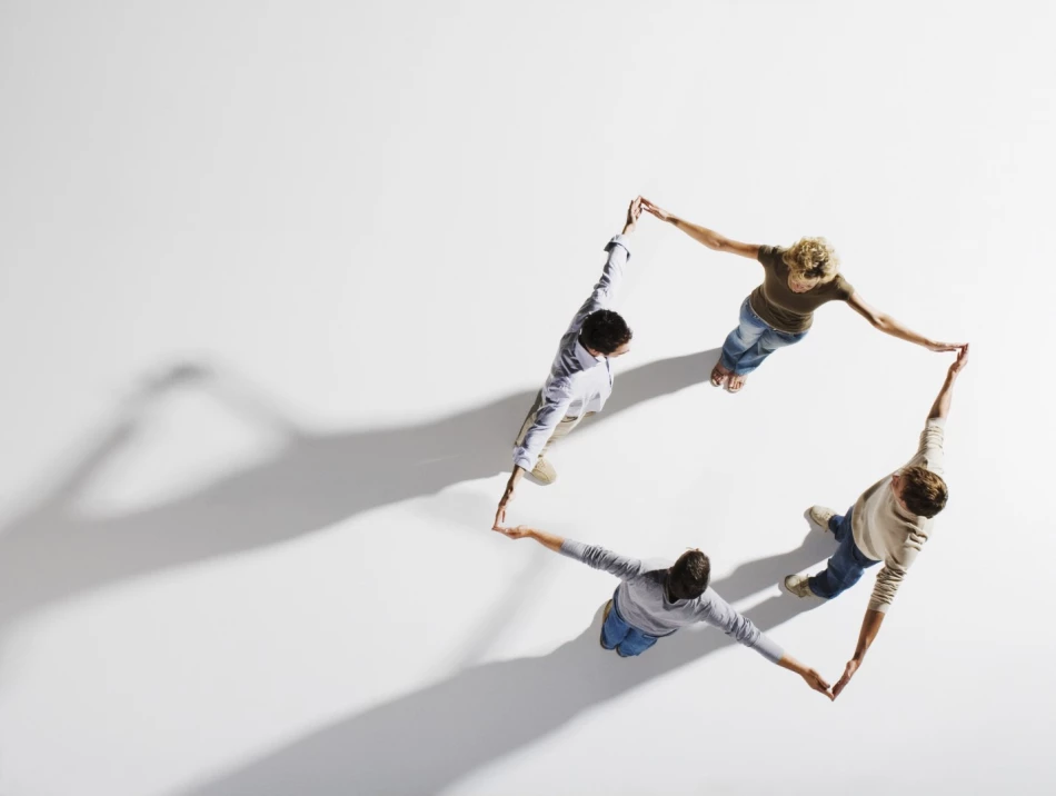 Several people are standing in a circular team formation seen from a top-down perspective on a bright background, holding hands. ISO Software Systems has been recognized in the Mittelstand 10,000 ranking by “Markt und Mittelstand,” in collaboration with Statista, as one of the Top 20 IT technology companies in Germany for 2025/2026. The ranking is considered a key reference for performance, stability, and future readiness in the midmarket.