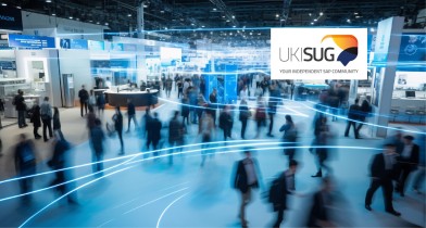 People attending a SAP community event with exhibition stands and the UKISUG logo in the foreground