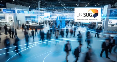 People attending a SAP community event with exhibition stands and the UKISUG logo in the foreground